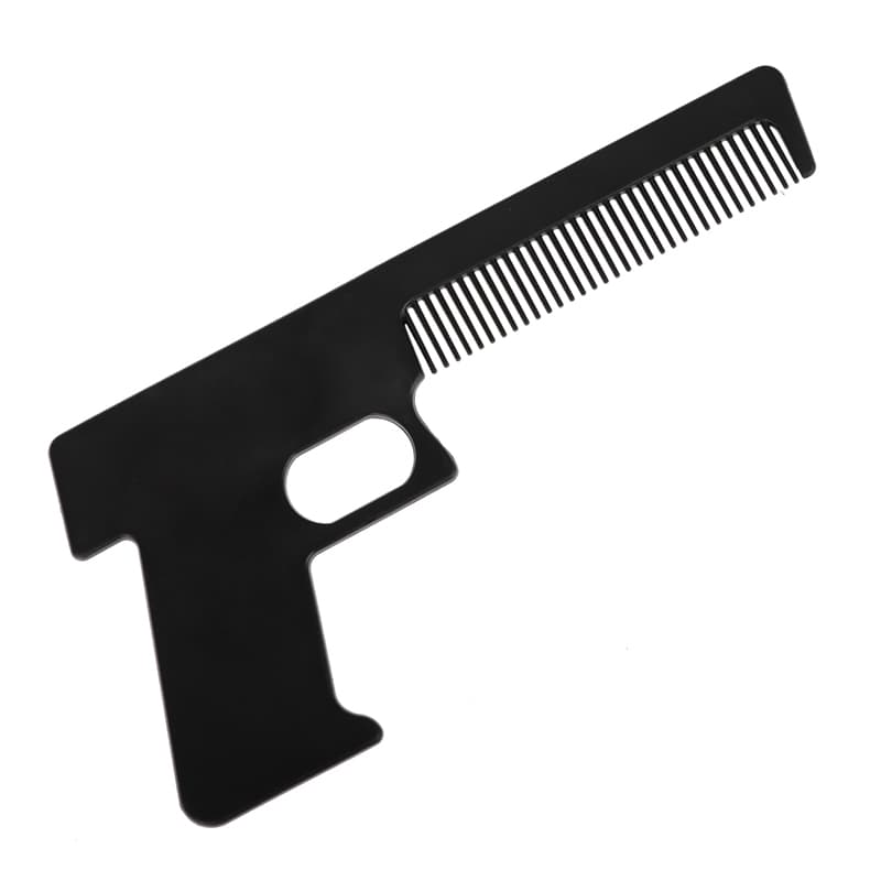 Comb Черен гребен за коса във формата на пистолет.